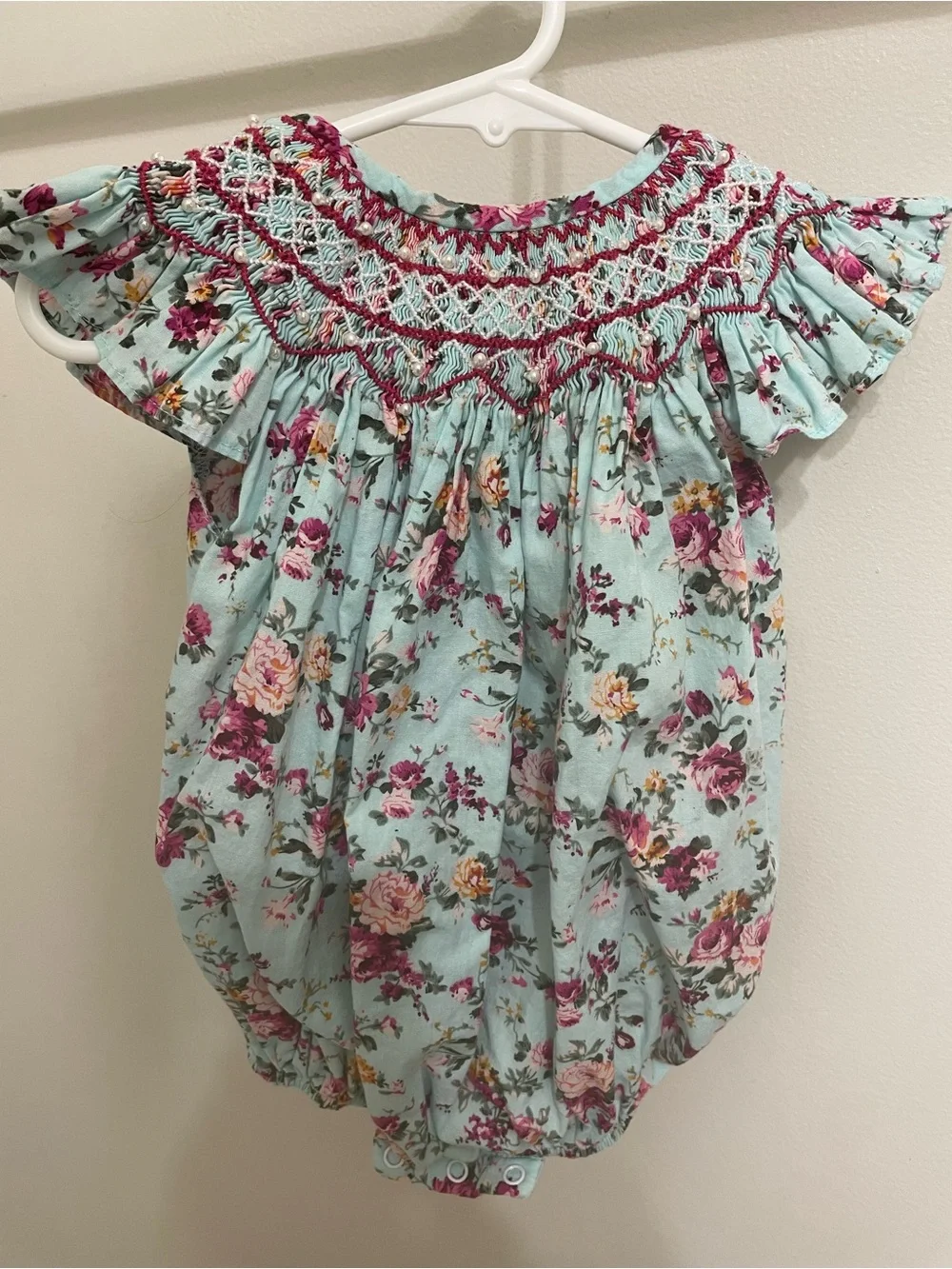 Floral Smocked Off-Shoulder Baby Top in Light Blue and Pink